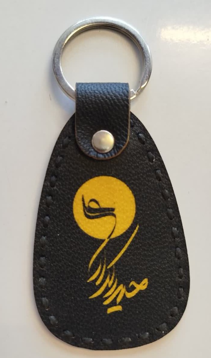 تصویر 2 محصول جاسوئیچی چرمی مشکی با زیره زرد